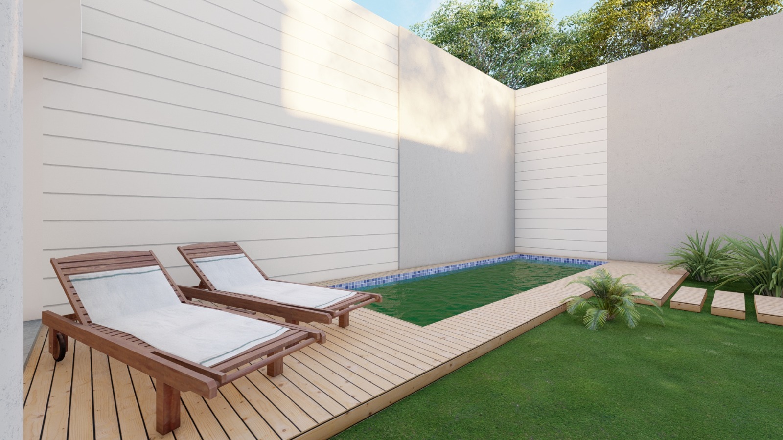 Visualización de la piscina y su solárium en el patio familiar.